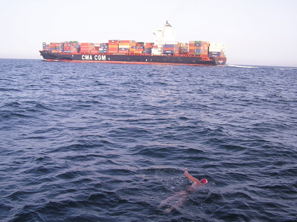 Rob swimming by a freighter in the English Channel