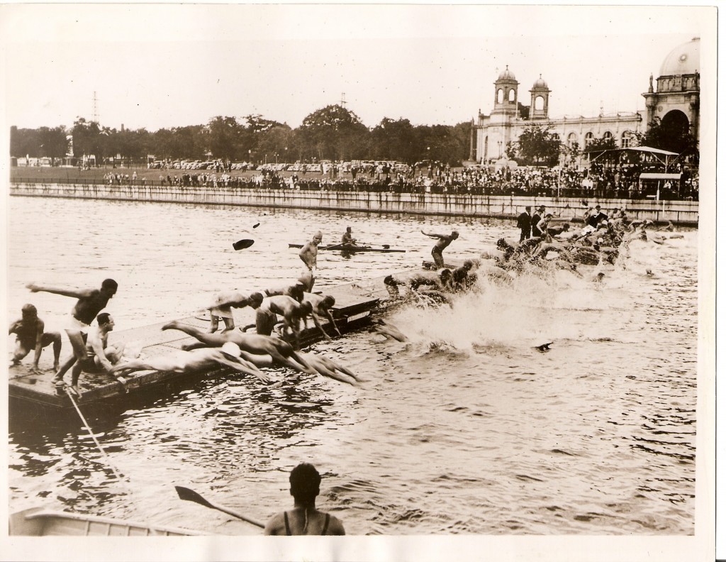 60 of the world's greatest distance and sprint swimmers are seen as they plunge into the 60 degree waters of frigid Lake Ontario, at the start of the 9th annual World's Champion Swim Marathon held at the Canadian National Exhibition, Toronto, Canada, Sep 1, 1936. Frank Pritchard, of Buffalo, NY crossed the finish line a new World's Champion, and created a new record for the course of 5 miles when he swam the distance in 2:07:09.