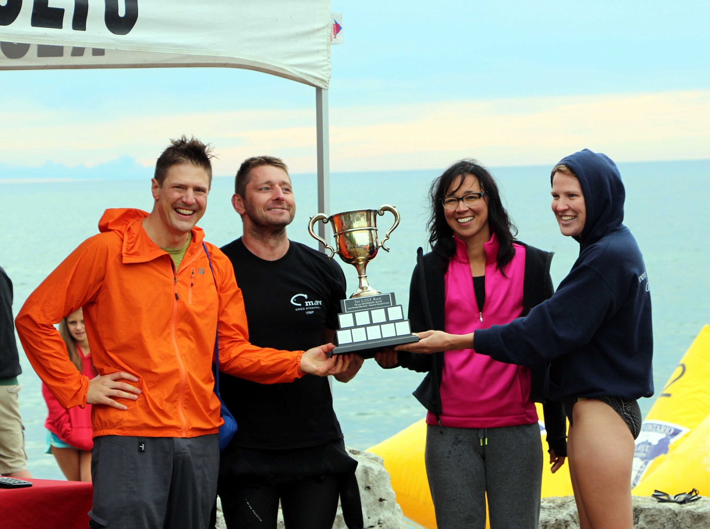 Winners of the 1000m; Mens Naked: Loren King, Mens Wetsuit and first overall: Greg Streppel, Womens Wetsuit: Lynn Rogers, Womens Naked: Sara Nicholson